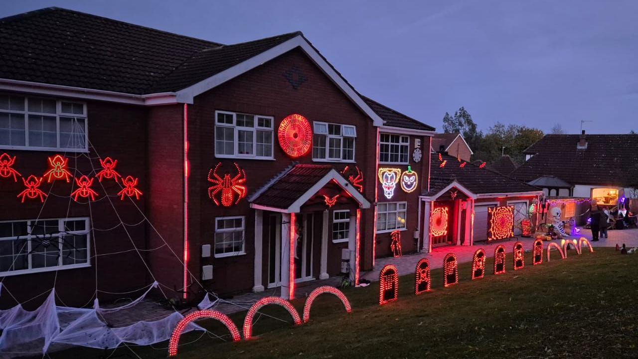 The image shows the house with the decorations