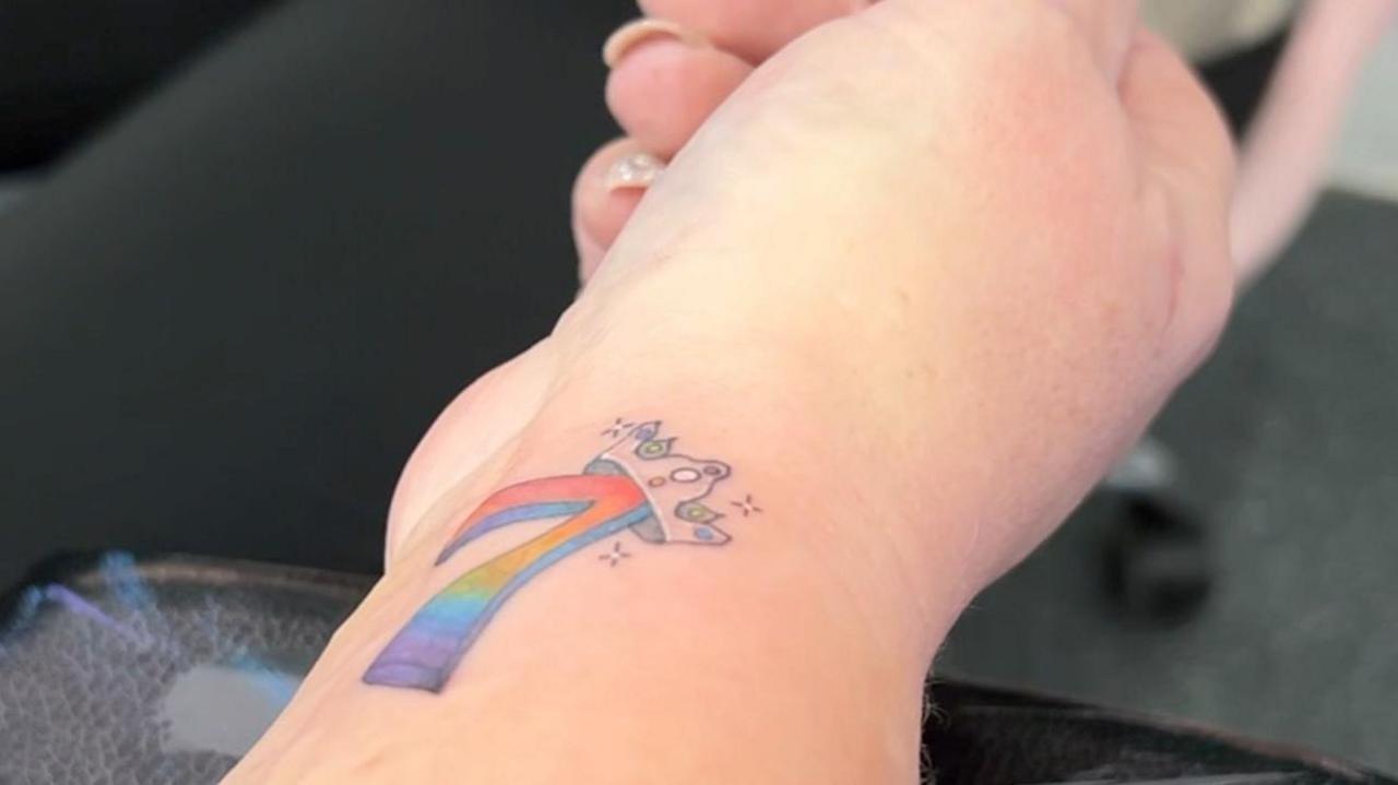 Tattoo on woman's wrist