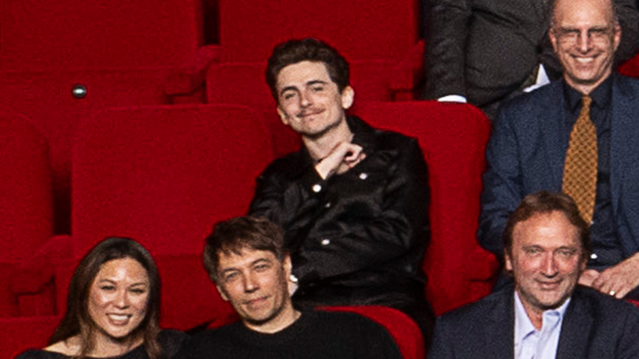 Timothée Chalamet, Samantha Quan and Sean Baker in the 97th Oscars nominees dinner class photo