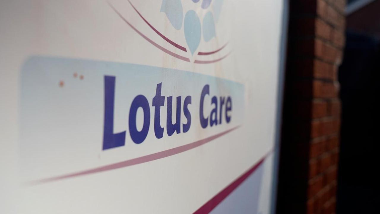 The logo of the Lotus Care company on a sign outside one of its premises.
