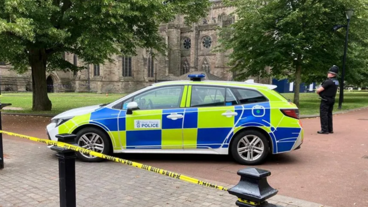 A police car outside Hereford Cathedral