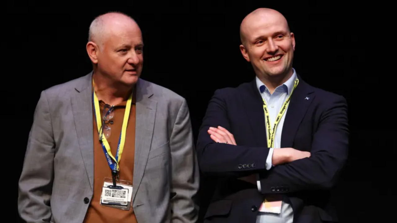 Murray Foote, left, pictured with the SNP's Westminster leader Stephen Flynn. The pair are looking off to the side. 