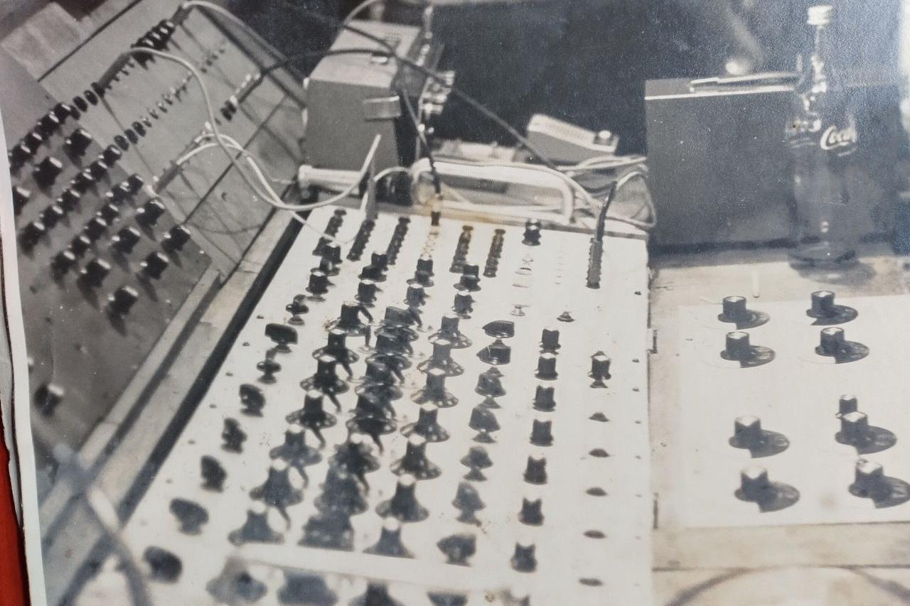 A black and white image of a mixing desk