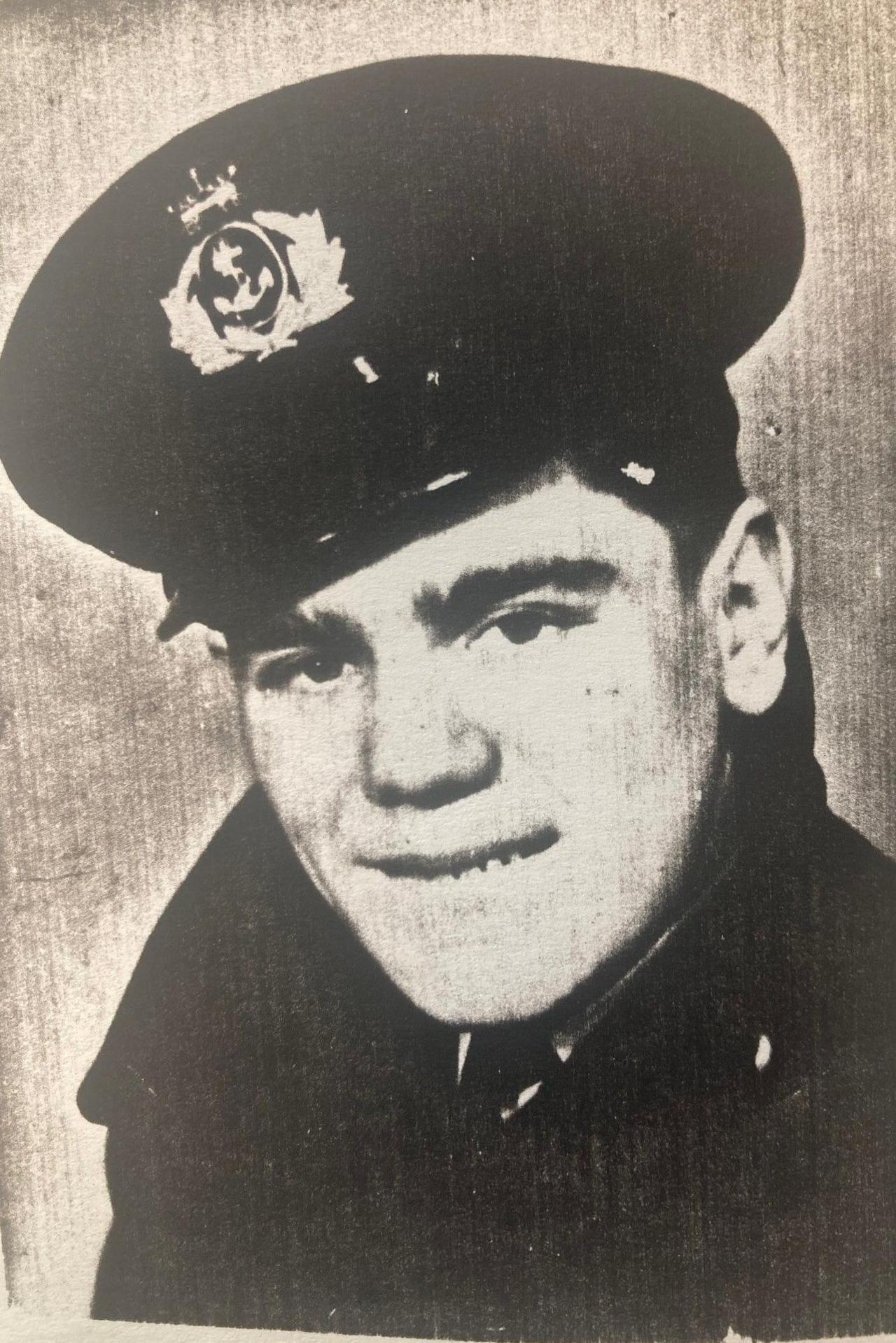 Peter Foxon in a black and white photo taken in 1941 wearing his uniform.