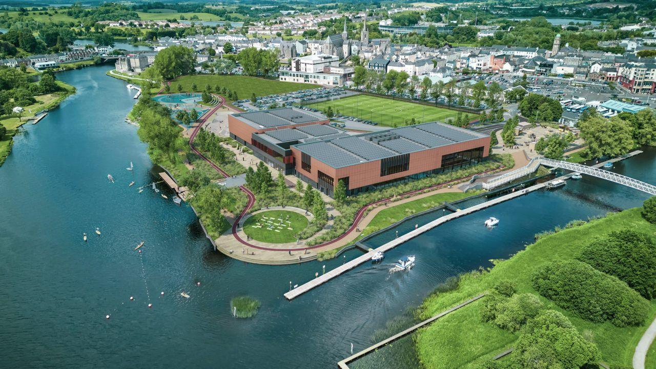 An artists depiction of a leisure centre which has been redeveloped. It is surrounded by water and trees.