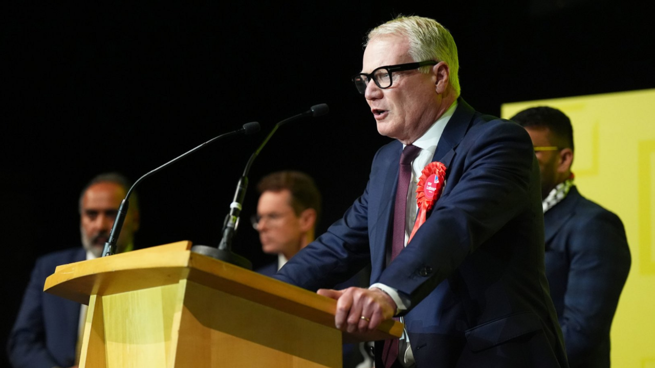 Richard Parker's victory speech, with the other candidates behind him