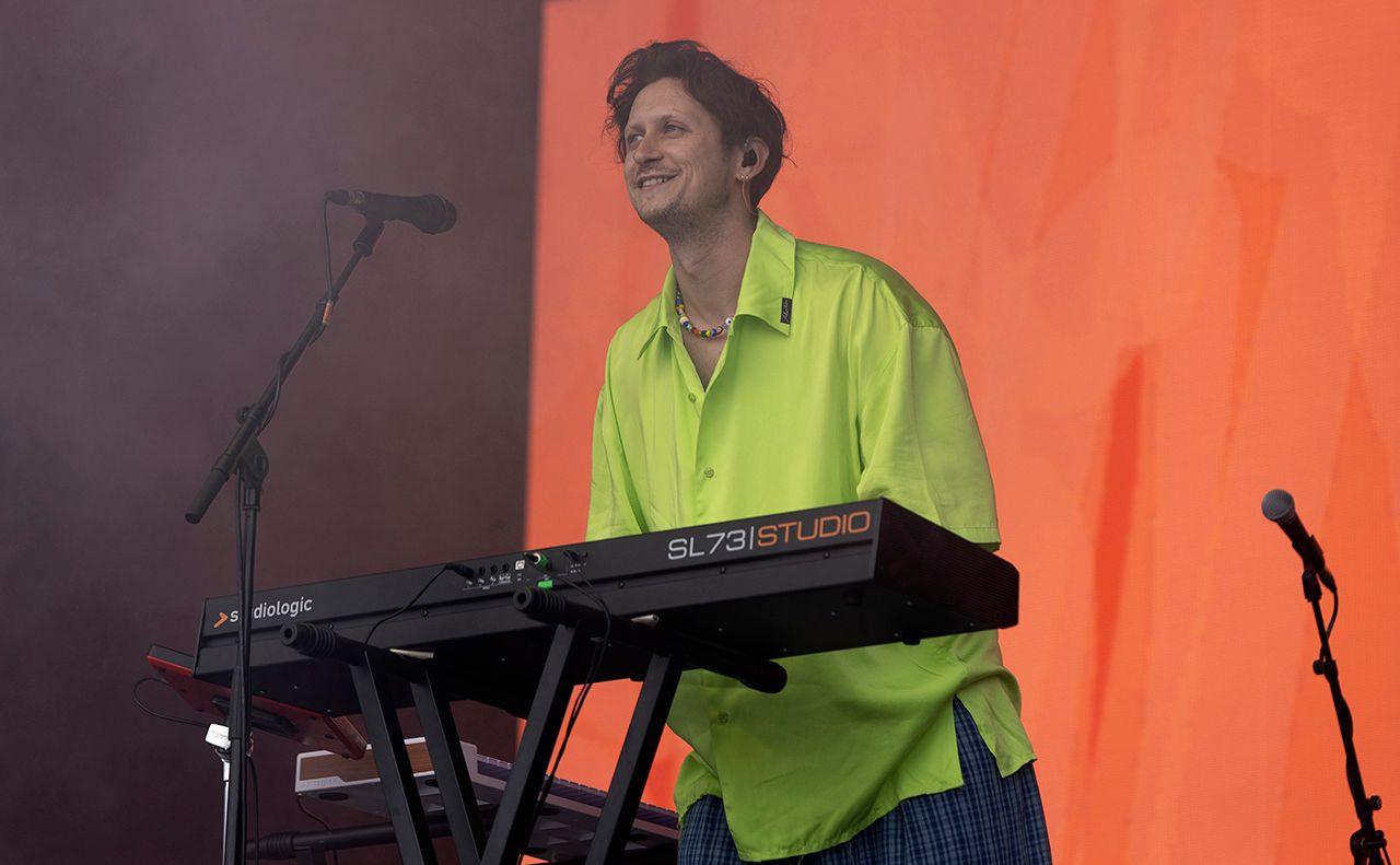 Barry Can't Swim, seen wearing a bagg lime green shirt, performing at Glastonbury Festival in June