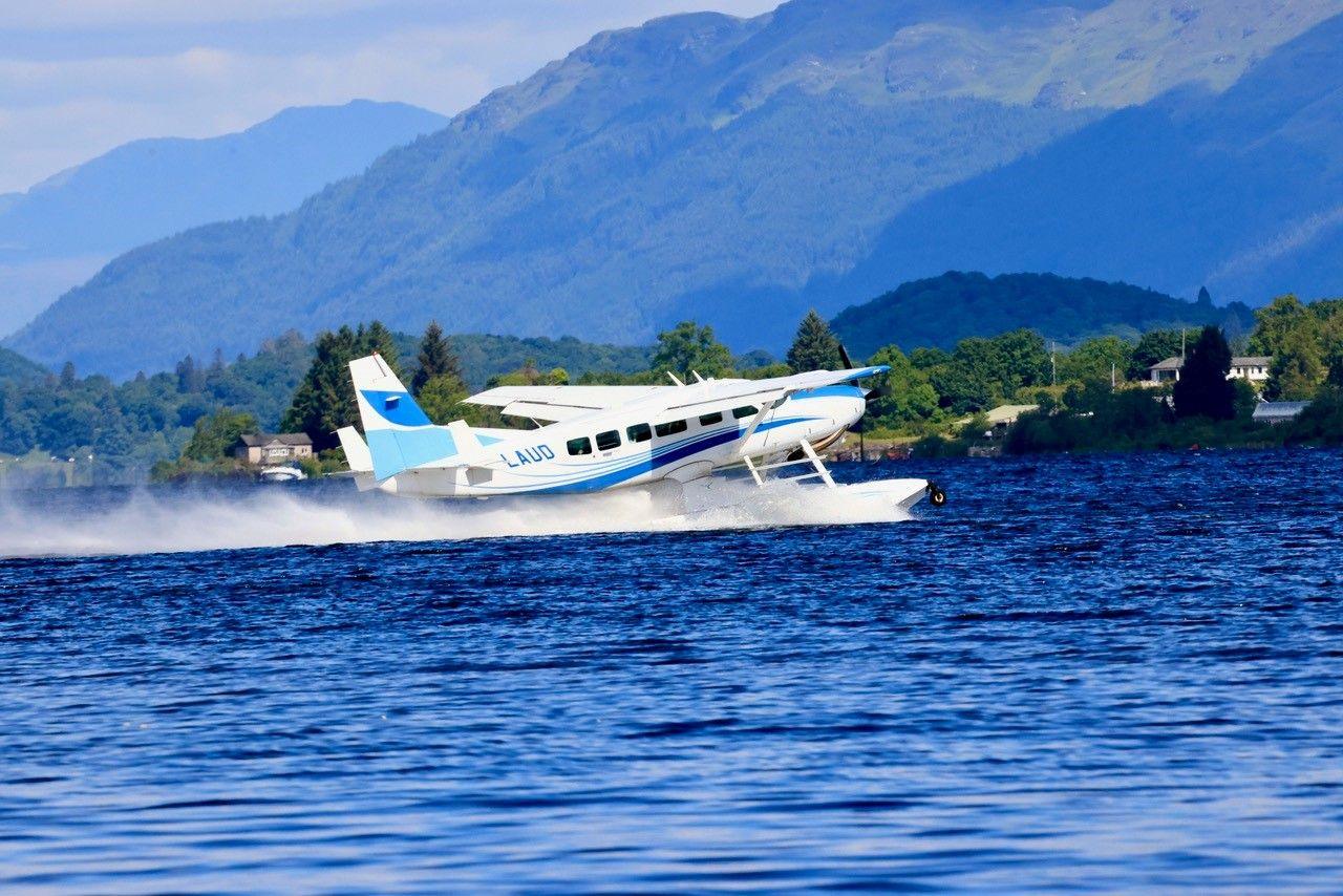 Seaplane taking off from Loch Lomond near Inchmurrin