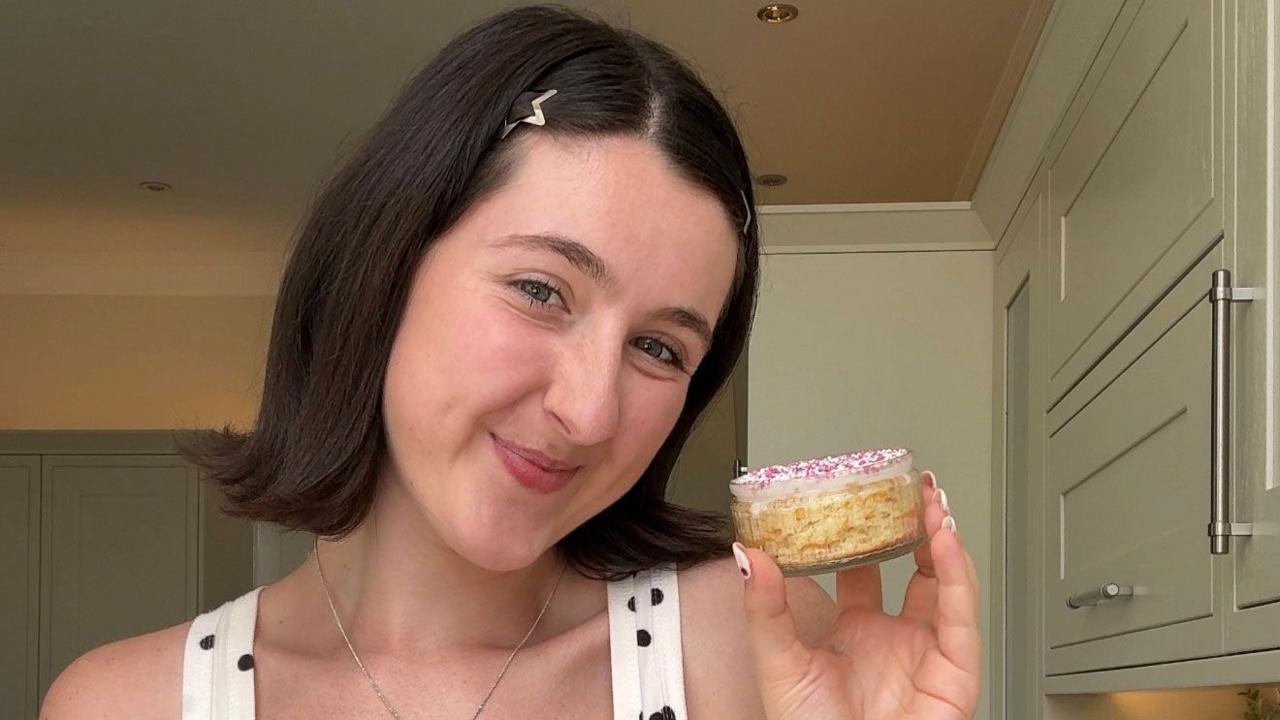 Chloe Rose Steen with her homemade dot cake