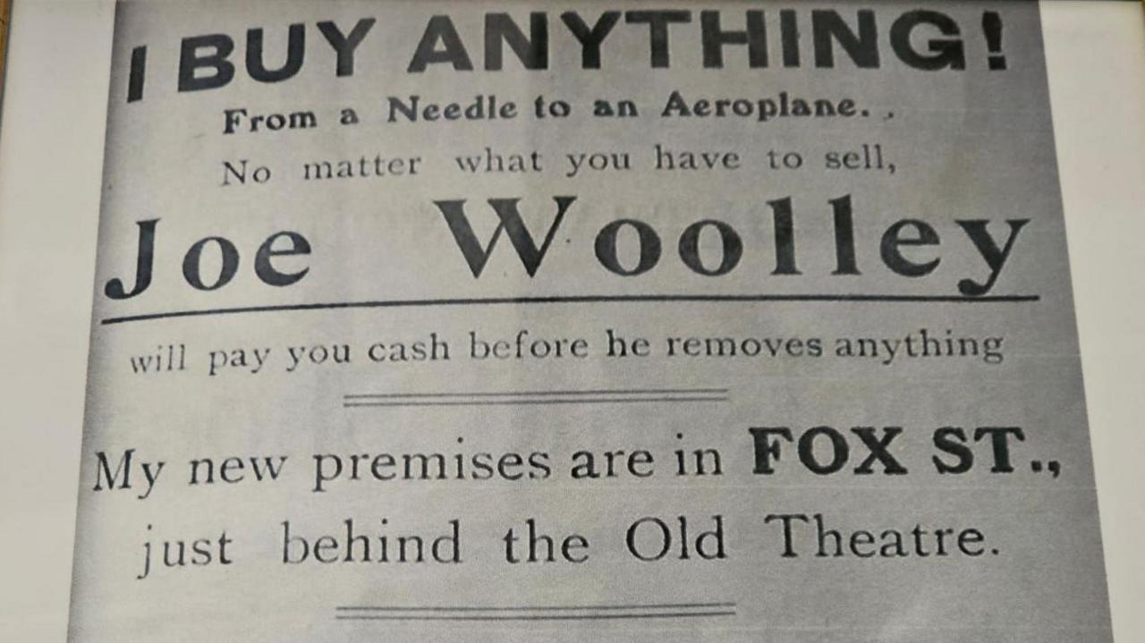 the picture shows an old leaflet handed out by ben grandfather - it reads, 'I buy anything'