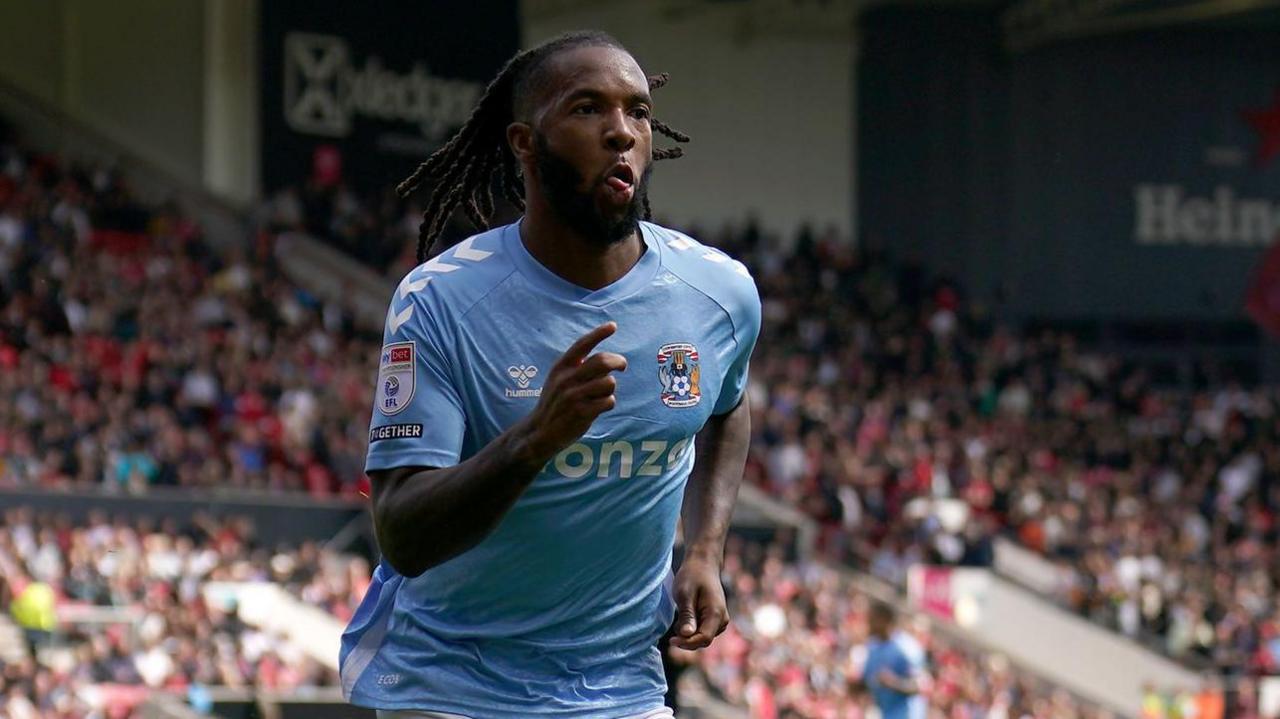 Kasey Palmer celebrates