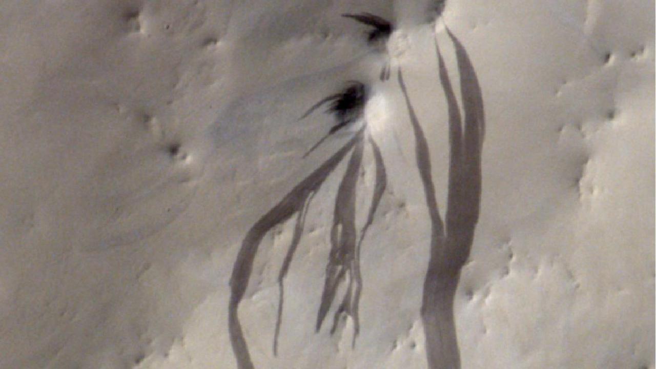 Picture showing some dark 'streaks' on Mars.