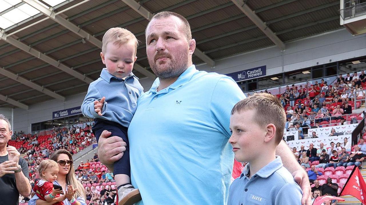 Ken Owens says goodbye to Scarlets fans with sons Efan and Talfan