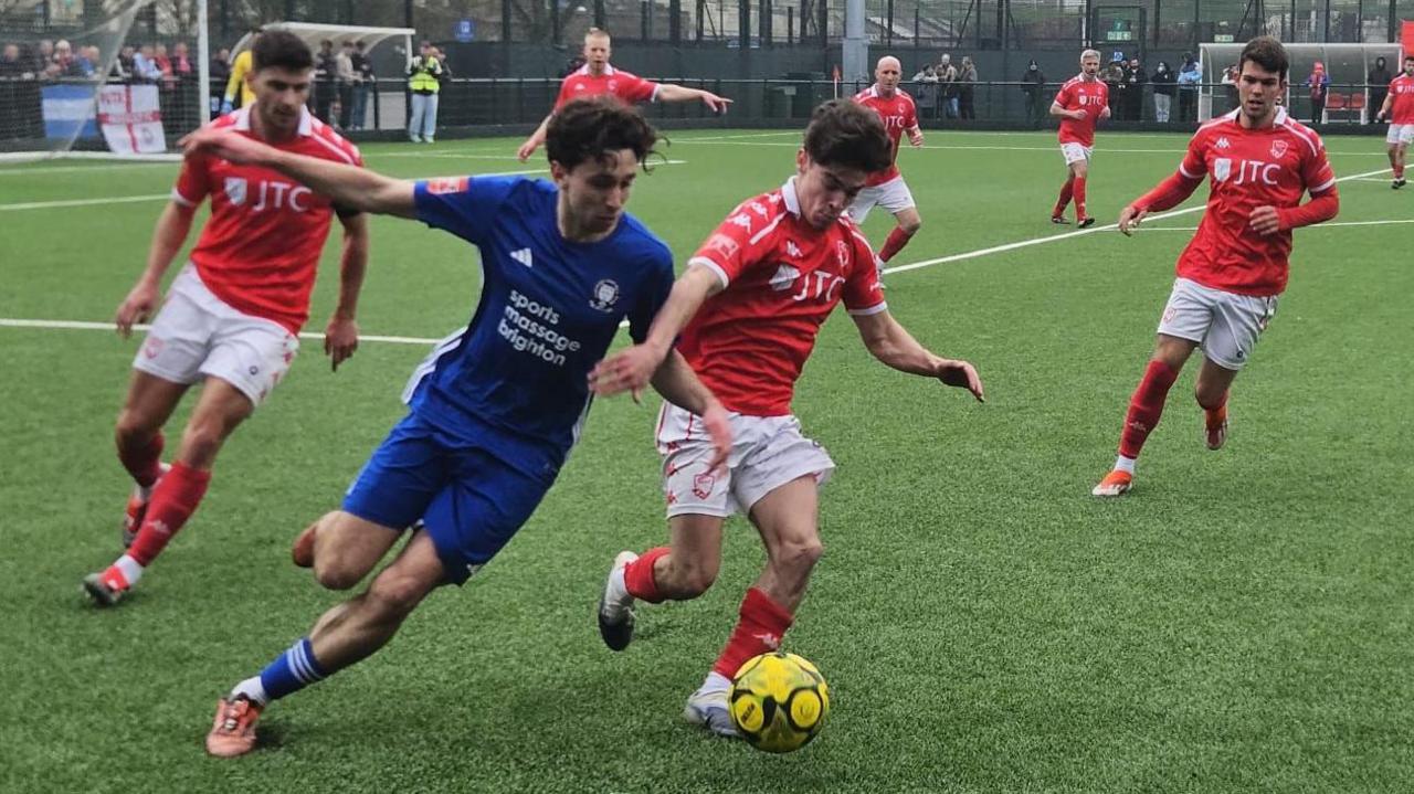 Action from Jersey Bulls v Hassocks