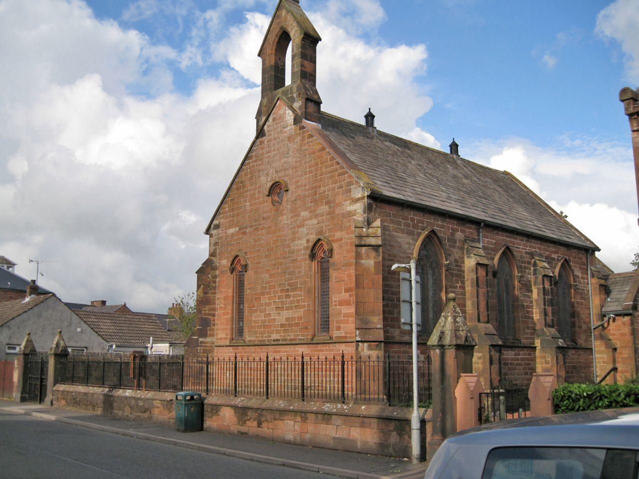 The same church from another angle with its sandstone top pointing up into the sky