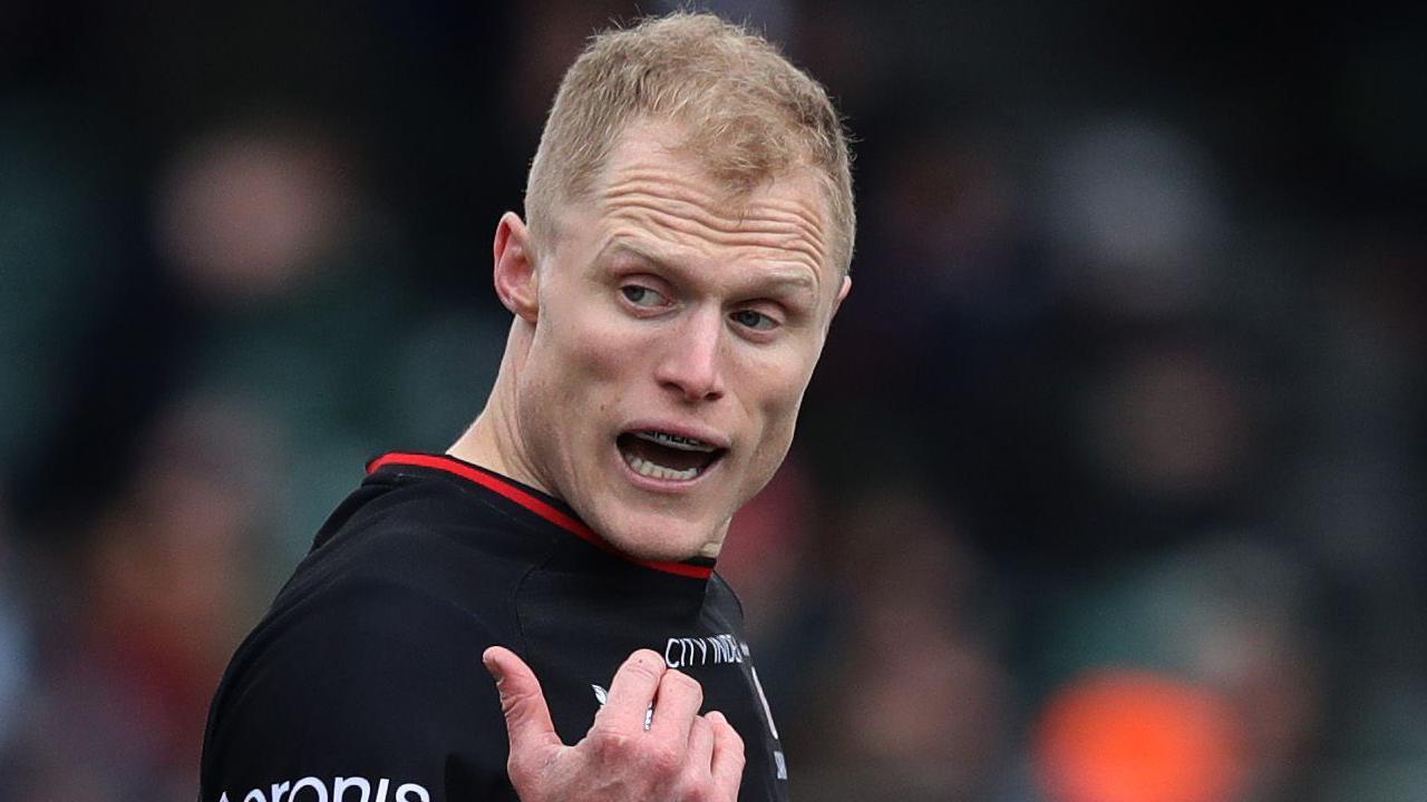 Aled Davies gestures to team-mates