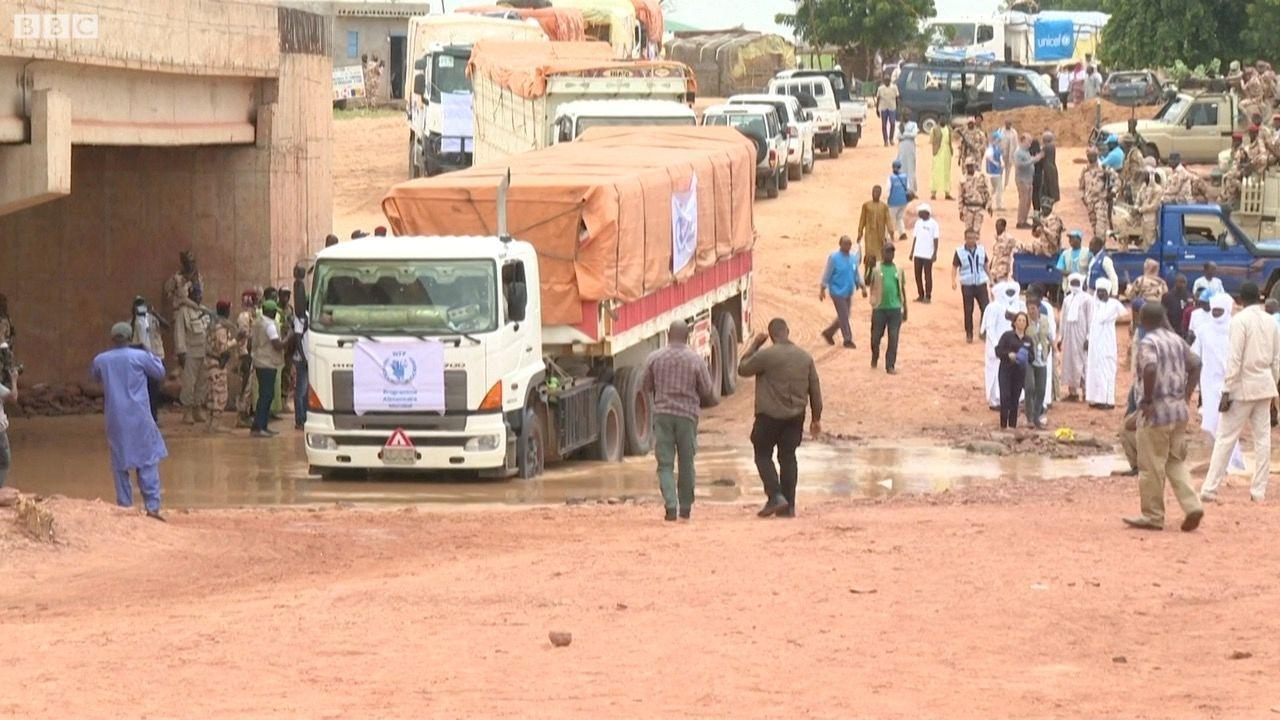 Aid trucks passing through Adré in Chad