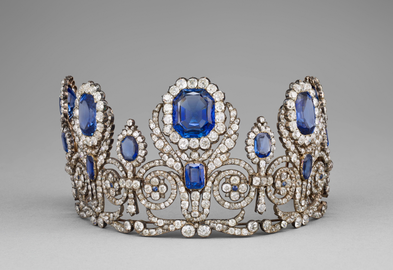 A silver crown encrusted with diamonds and blue emeralds stolen from the Louvre