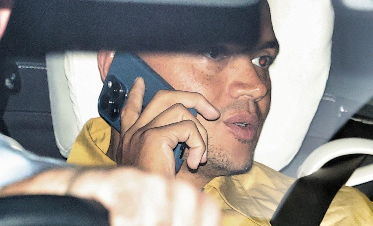 Jermaine Jenas speaks on the phone while in a car driving after leaving talkSport on 23 August