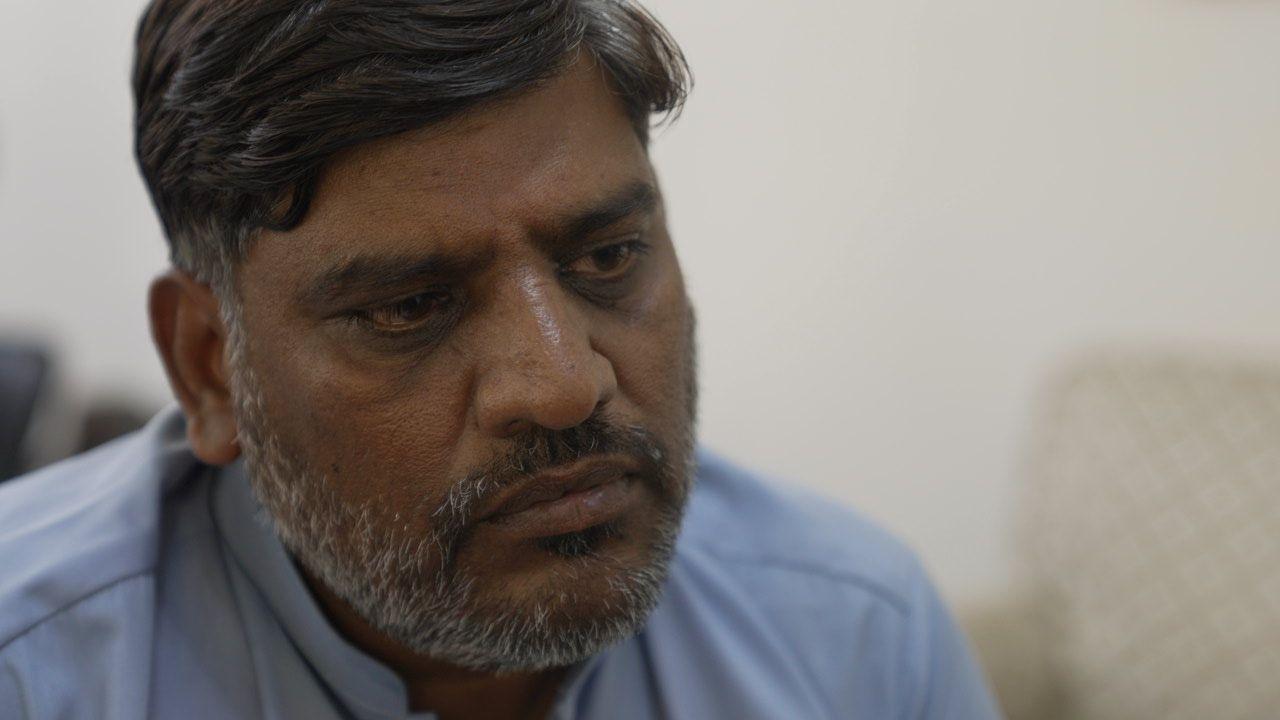 Nasir Mehmood, wearing a light blue shirt