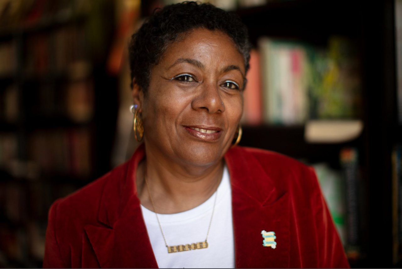 Patrice Lawrence smiling at the camera.