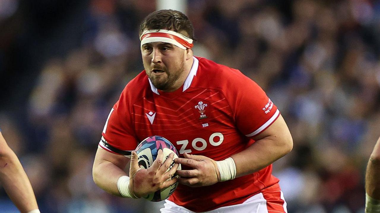 Wales prop Wyn Jones carries the ball against Scotland in the Six Nations