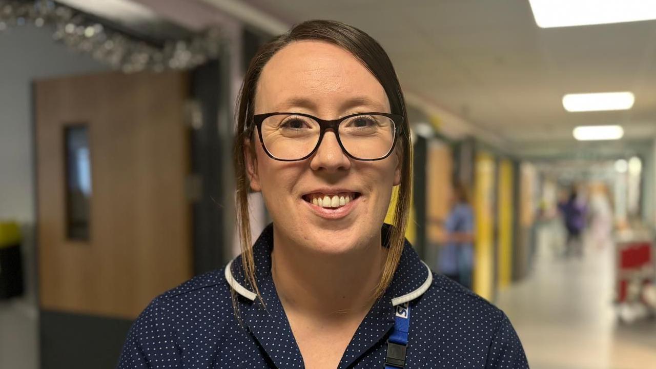 Catherine Hunter, Lead Nurse for Respiratory and Heart Services at NUH NHS Trust standing in a hospital corridor