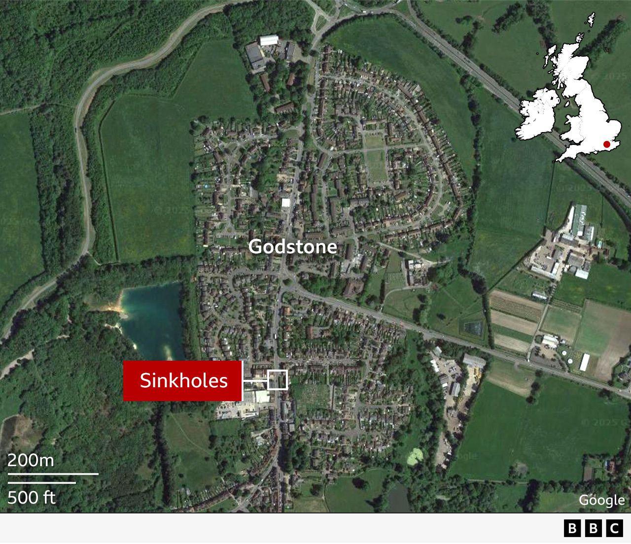 Satellite map of Godstone, Surrey, showing with a red label the approximate location of the sinkholes, near 58 Godstone High Street.