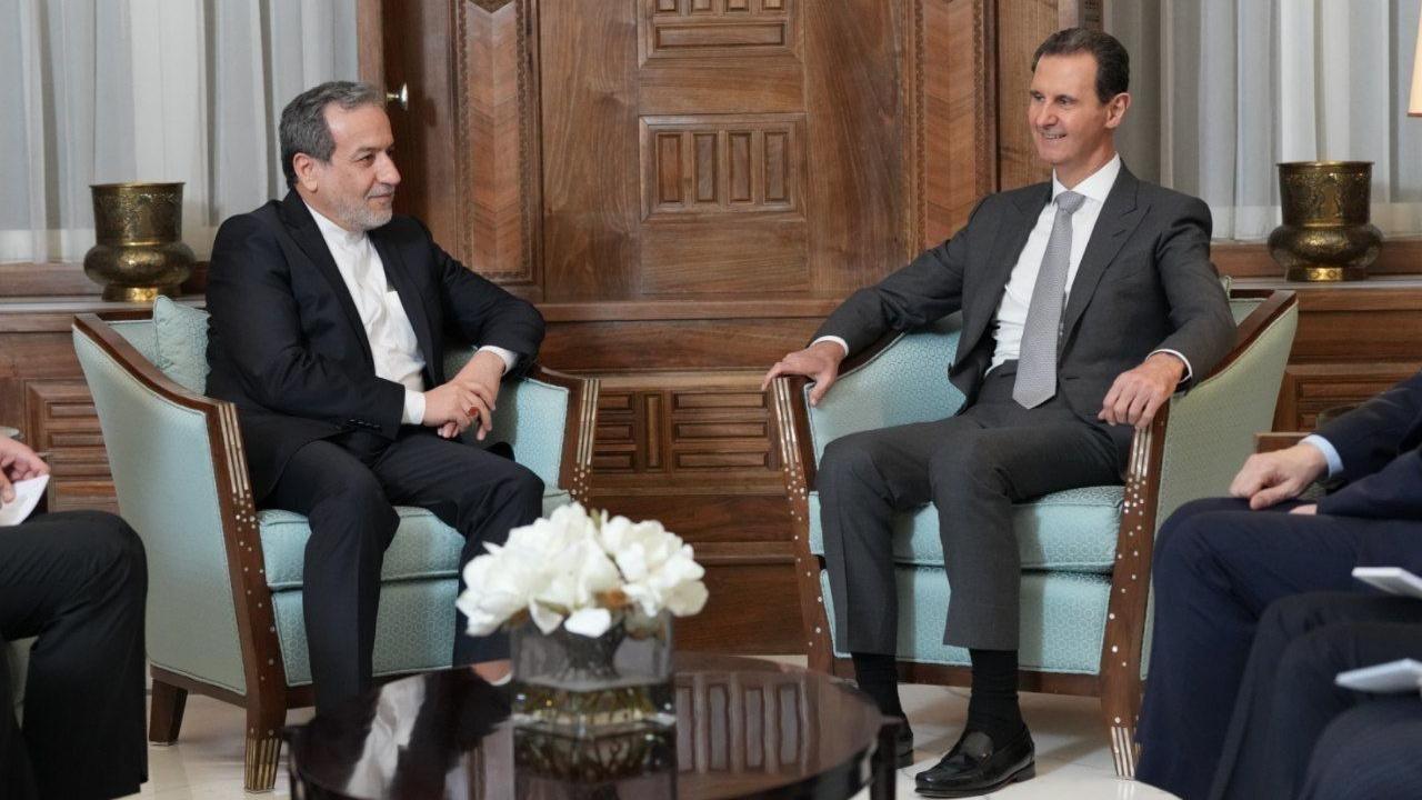 Syrian President Bashar al-Assad (R) meets Iranian Foreign Minister Abbas Araqchi in Damascus, Syria (1 December 2024)