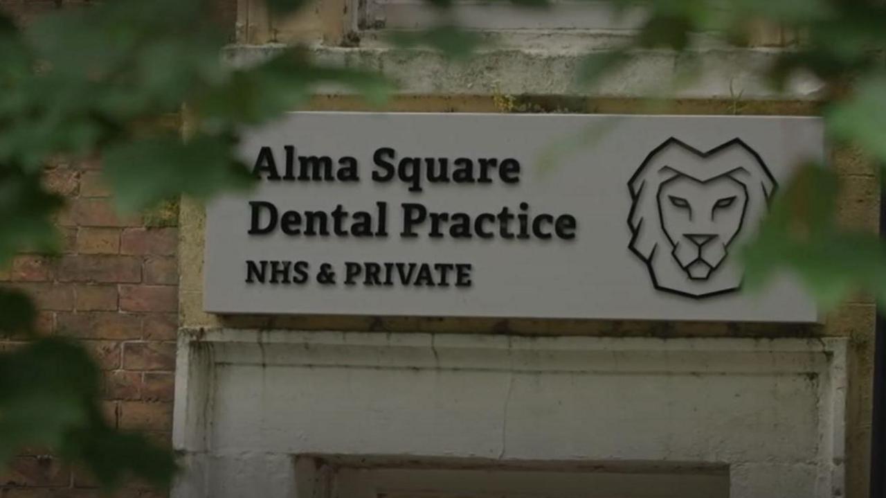 Alma Square Dental Practice sign