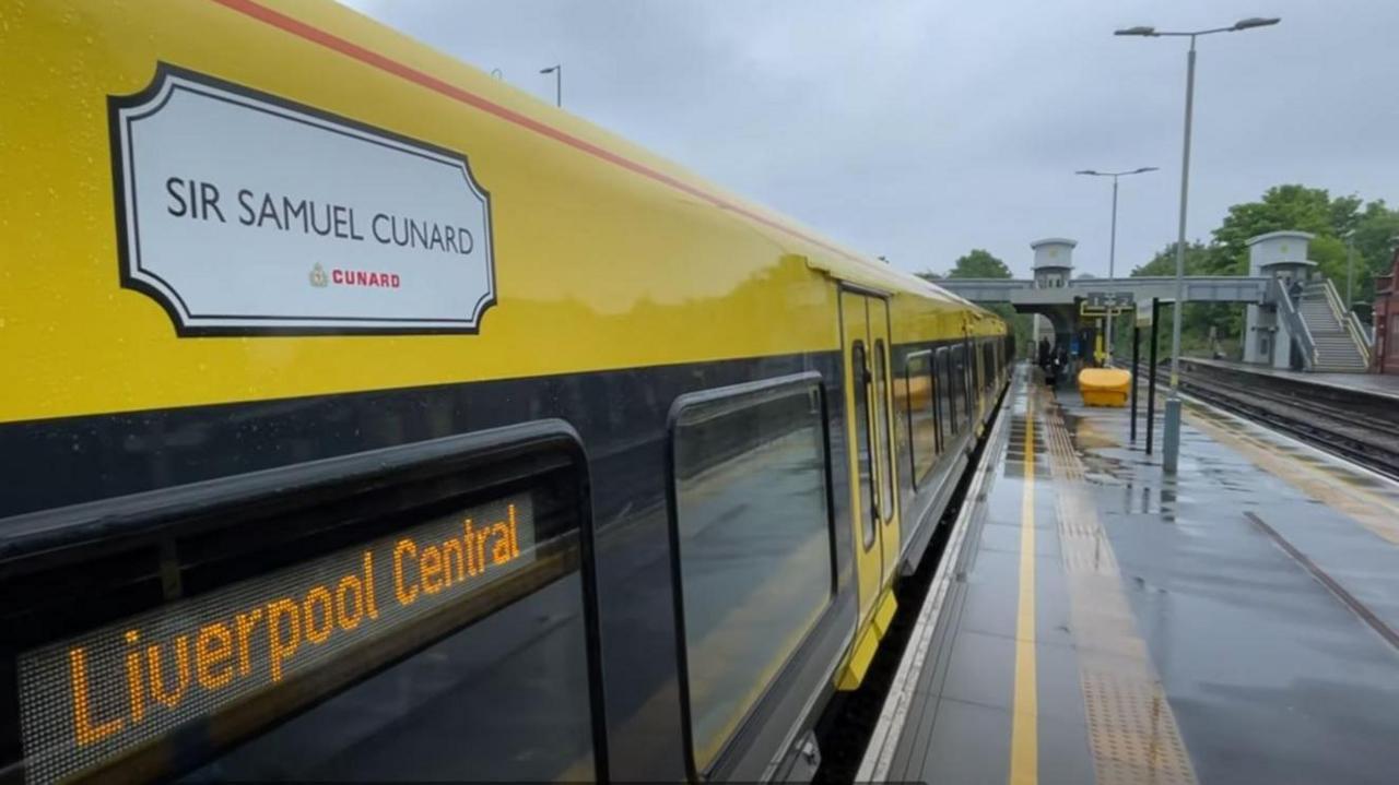 Merseyrail train named Sir Samuel Cunard 