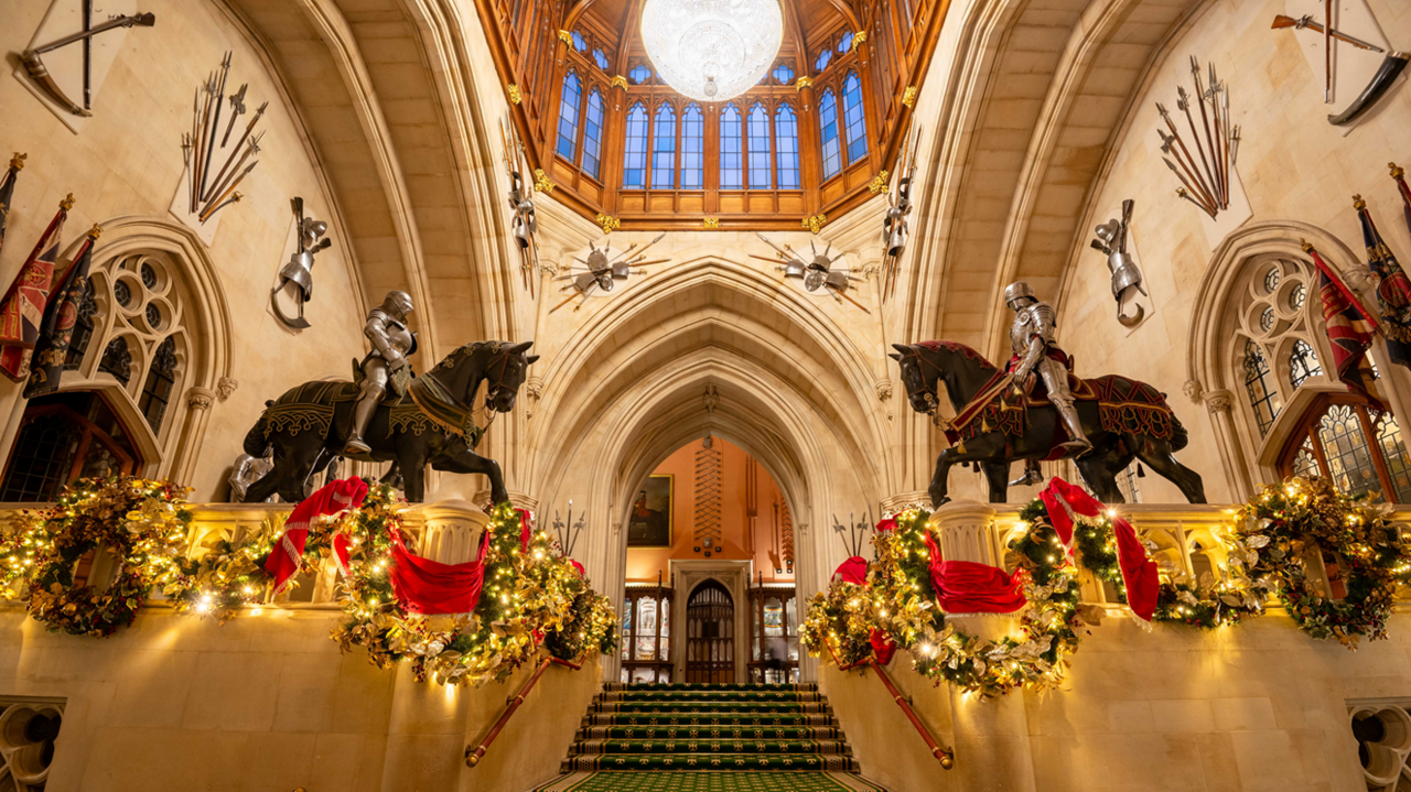 Another view of the staircase. Life-size model horses with knights in armour are on each side.