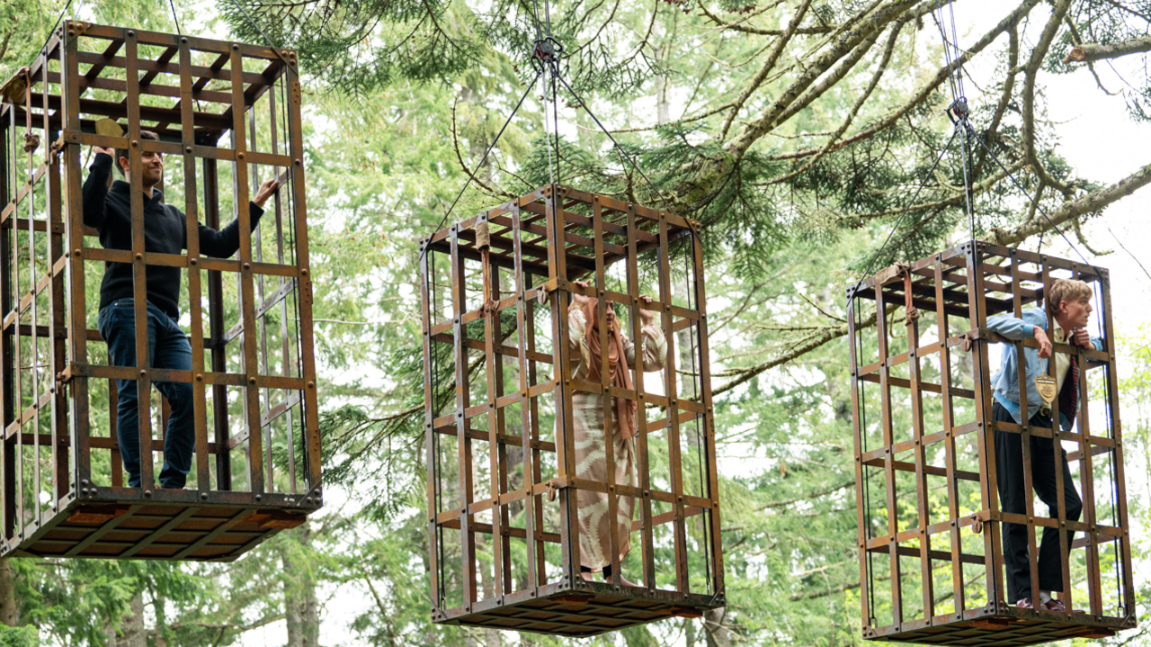 Alexander, Fozia and Jack in cages 