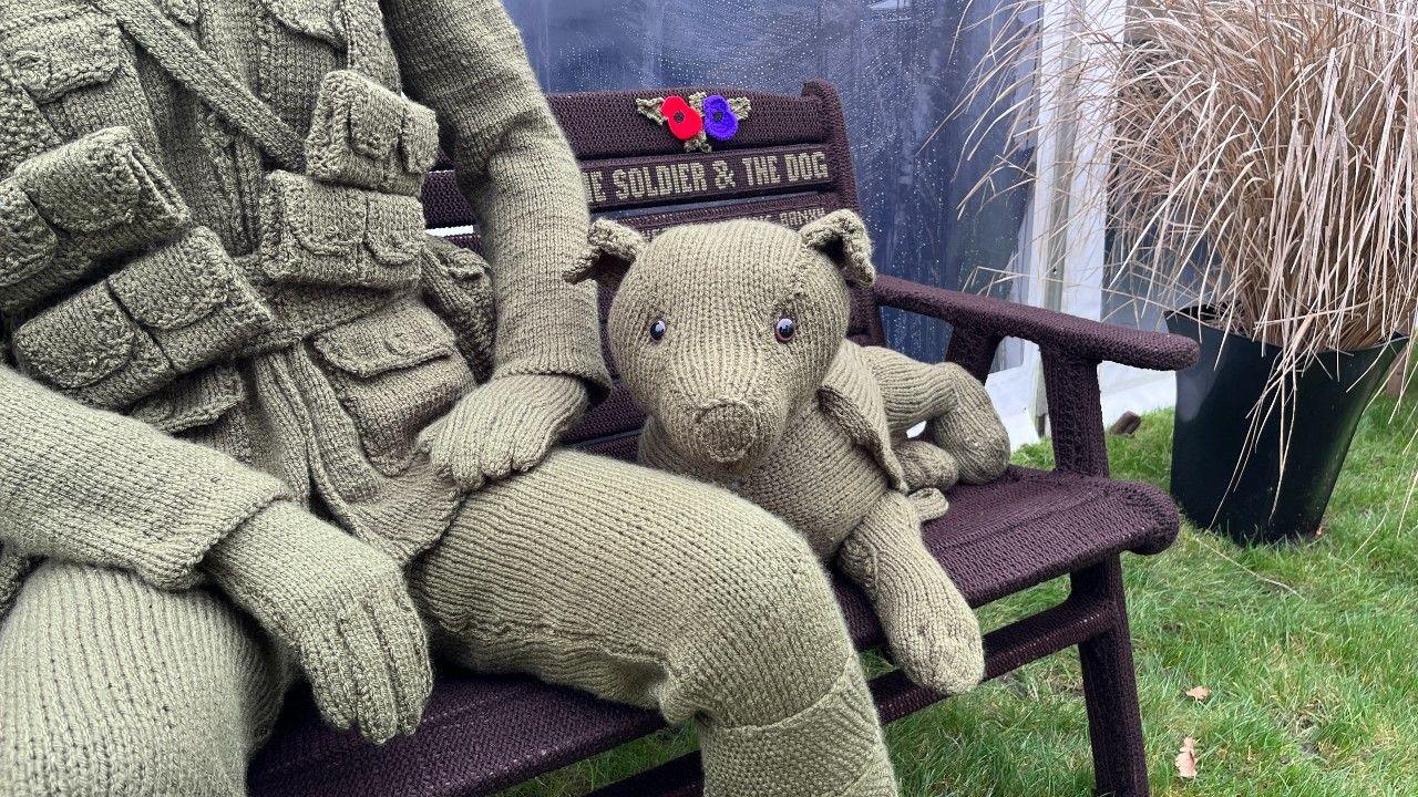 Close up of the knitted dog figure.