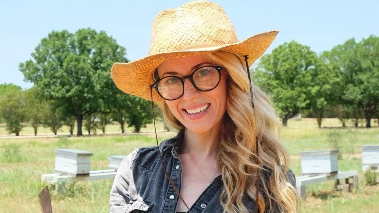 Woman wears straw hat 