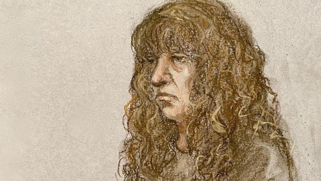 Court sketch of Ms Pexton wearing a tracksuit and looking unhappy. She has long brown straggly hair.