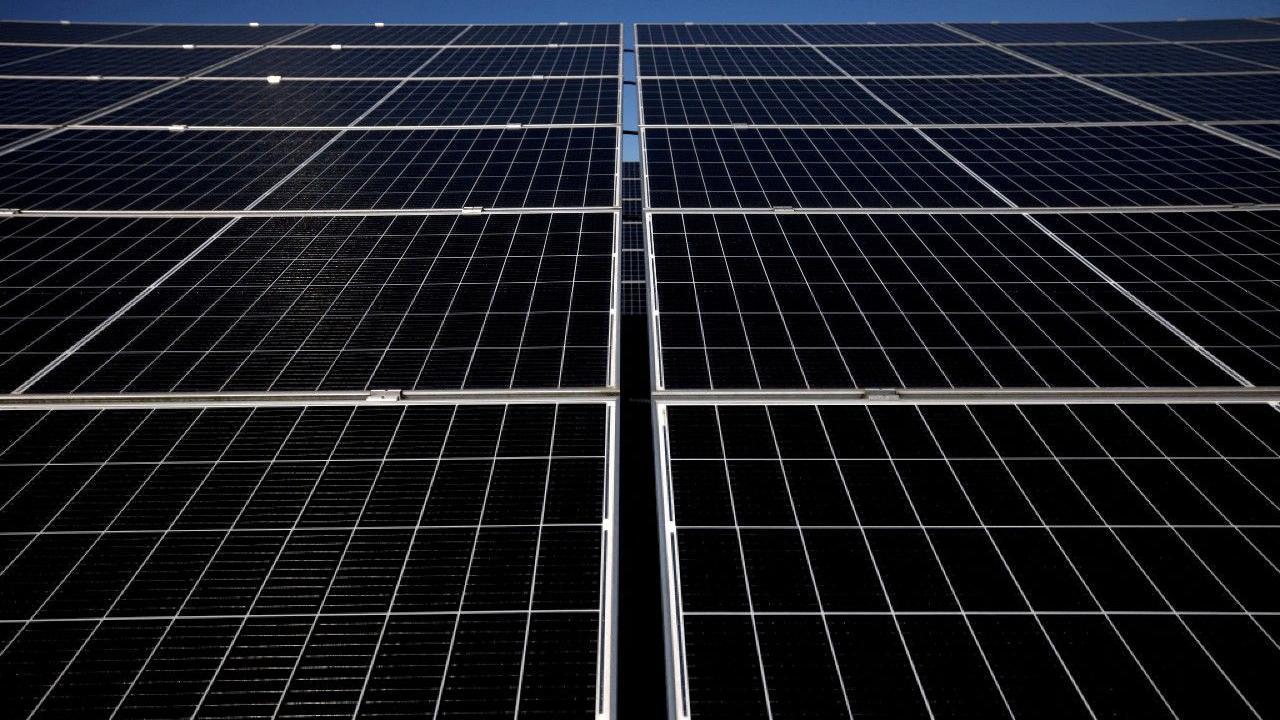 Close up of solar panels, showing the dark coloured cells making up a grid