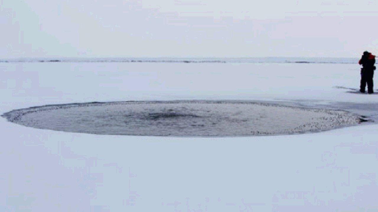 Scientist beside methane seep. Image: University of Alaska / Nature Geoscience