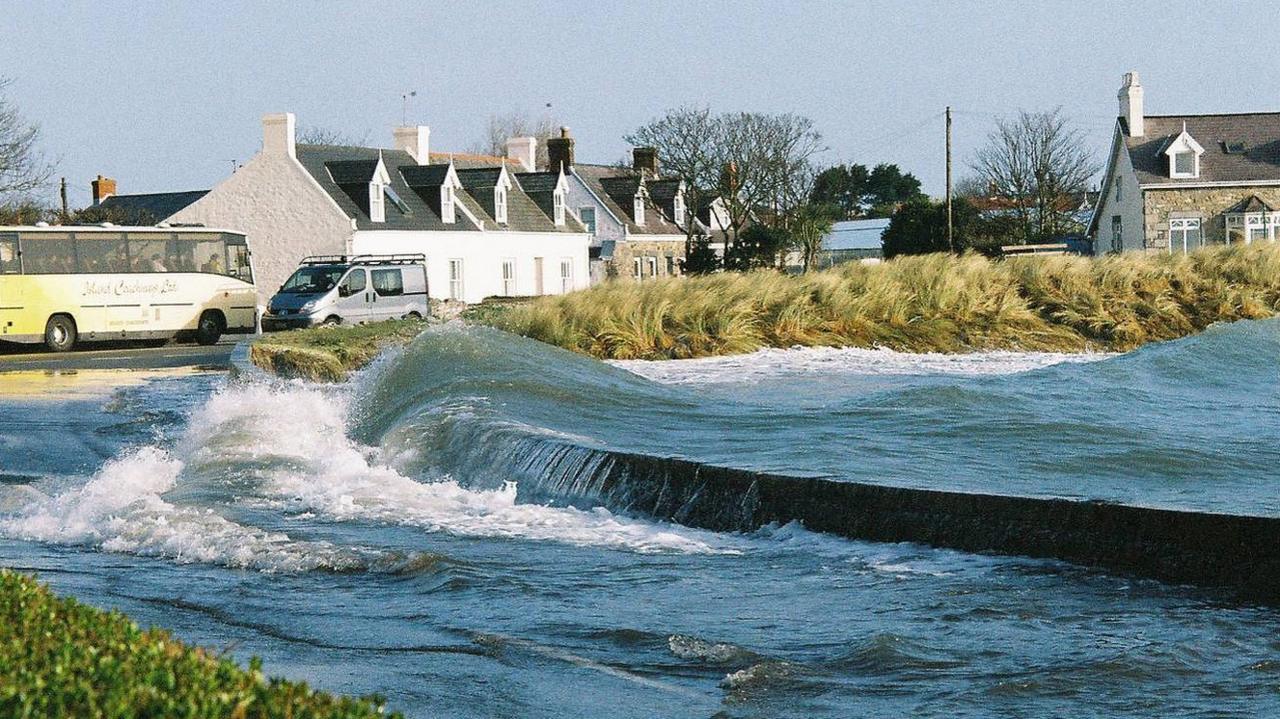 Waves coming over the sea wall at Bordeaux