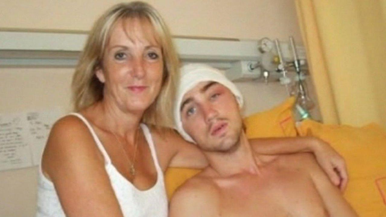 Rob Hughes with his mother Maggie when he was recovering from the attack in hospital