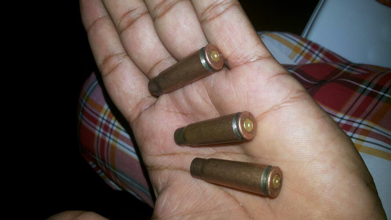 Bullet casings in a civilian's hand, Bujumbura