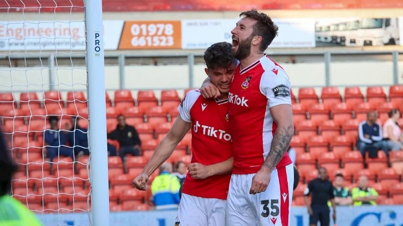 Wrexham's Ollie Palmer and Jordan Davies ceelbrate a goal