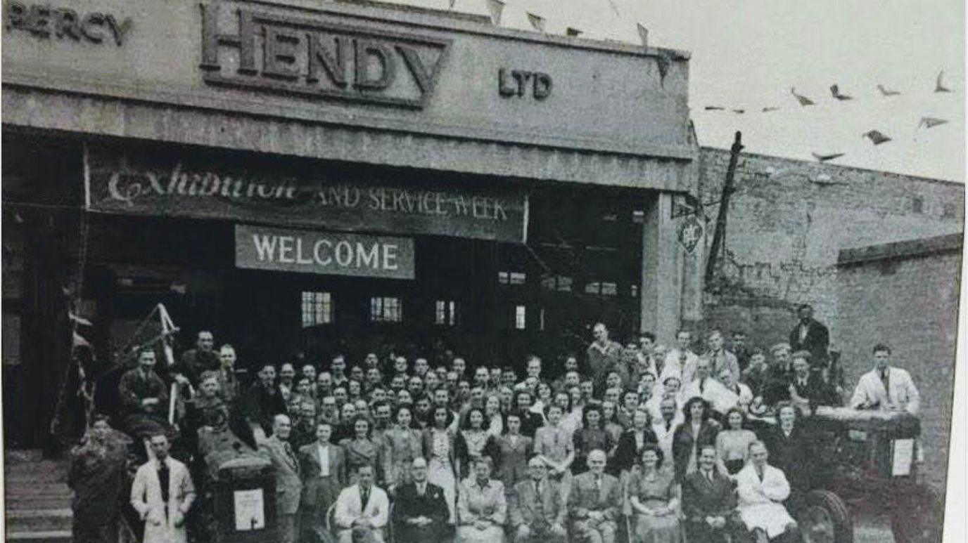 Dozens of Hendy Ford staff outside the firm's former dealership in Vincents Walk, Southampton in the 1950s.