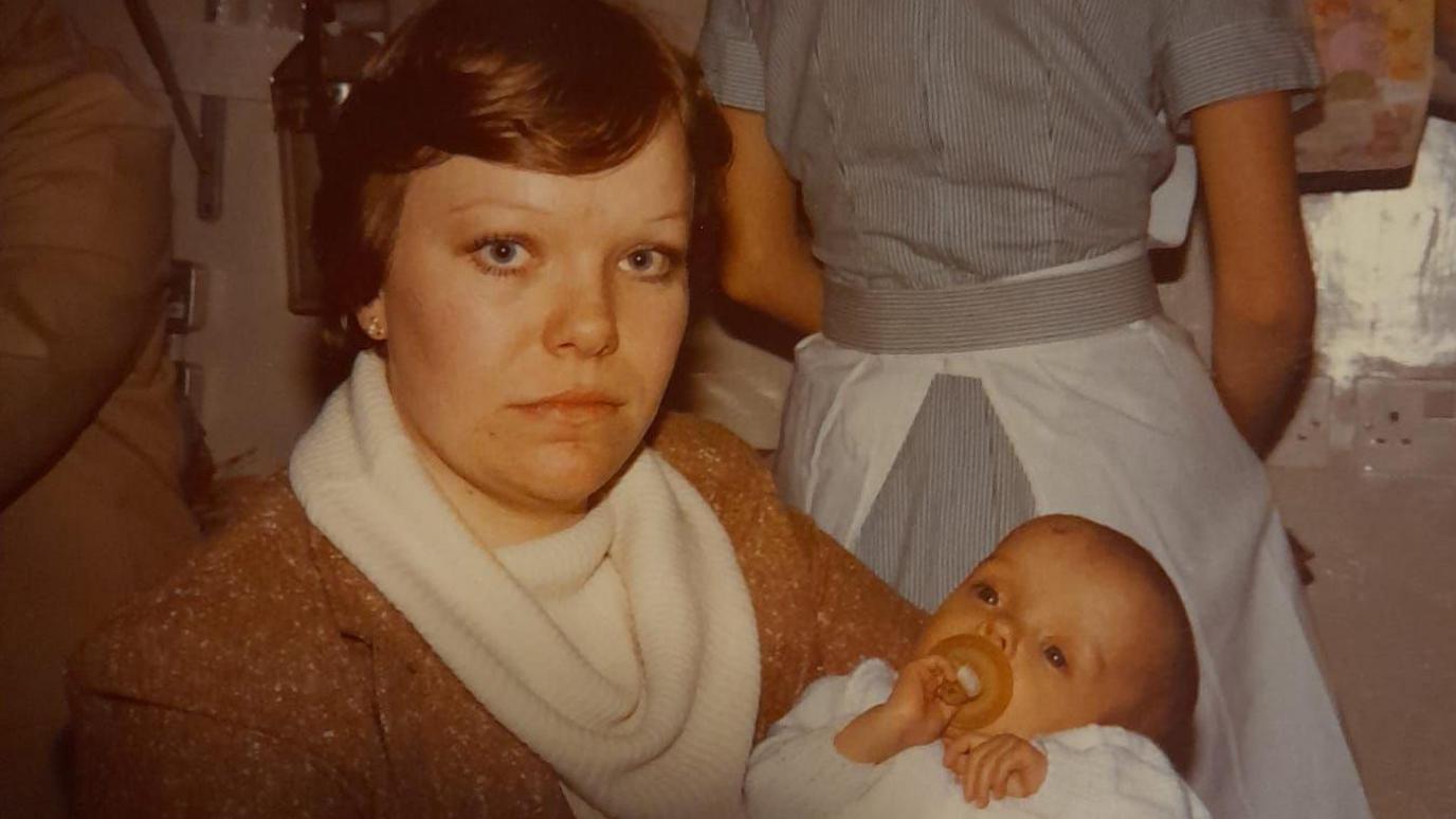 Carol Brown holding a baby that was transferred from New Cross Hospital to Great Ormond Street in London hospital in London