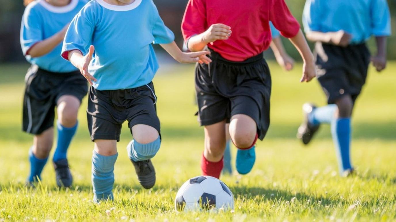 Children playing football