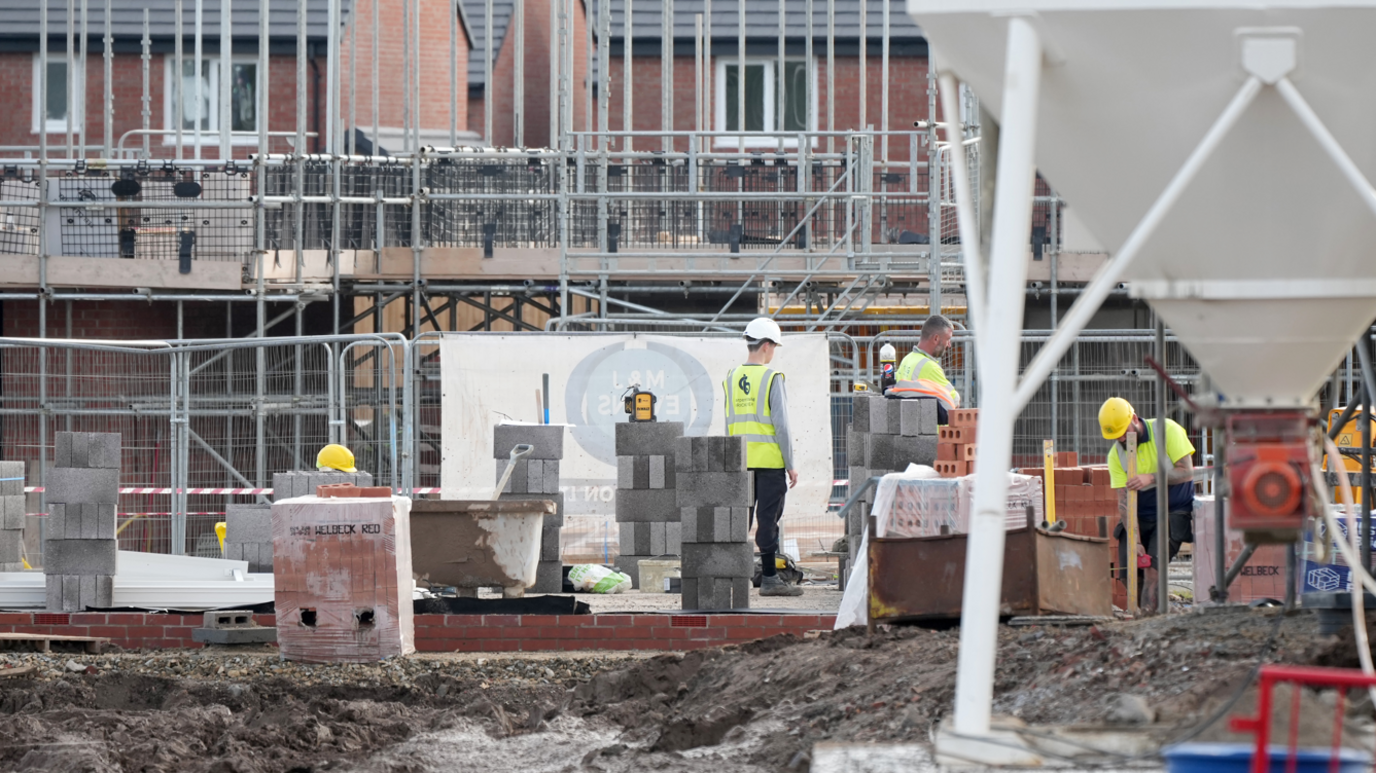 Builders at work on a site