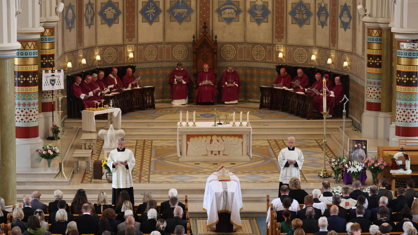 Mourners at the funeral of Archbishop Treanor in St Peter's Cathedral on 20 August