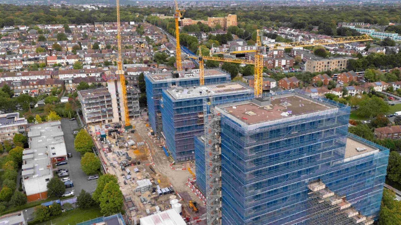 An aerial picture taken with a drone shows a construction site for a residential apartment block in Walthamstow, east London, Britain, 29 September 2025