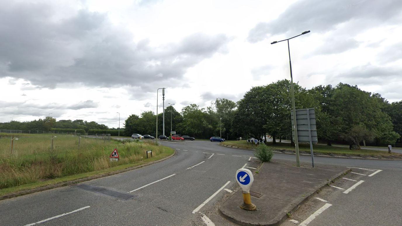 A roundabout with Dunmore Road in the foreground, and Oxford Road to the left