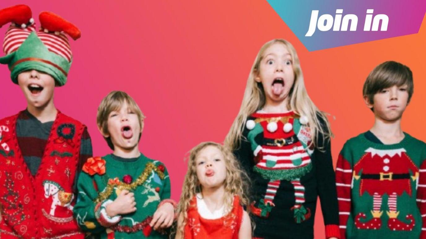 children in xmas jumpers